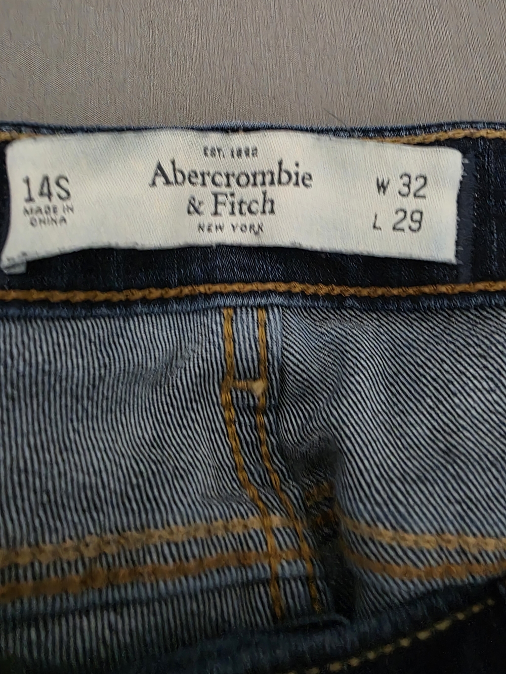 Abercrombie & Fitch Men's Dark Blue Denim Jeans with Contrast Gold Stitching